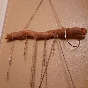 Example. Boho jewelry organizer w/gold hooks.